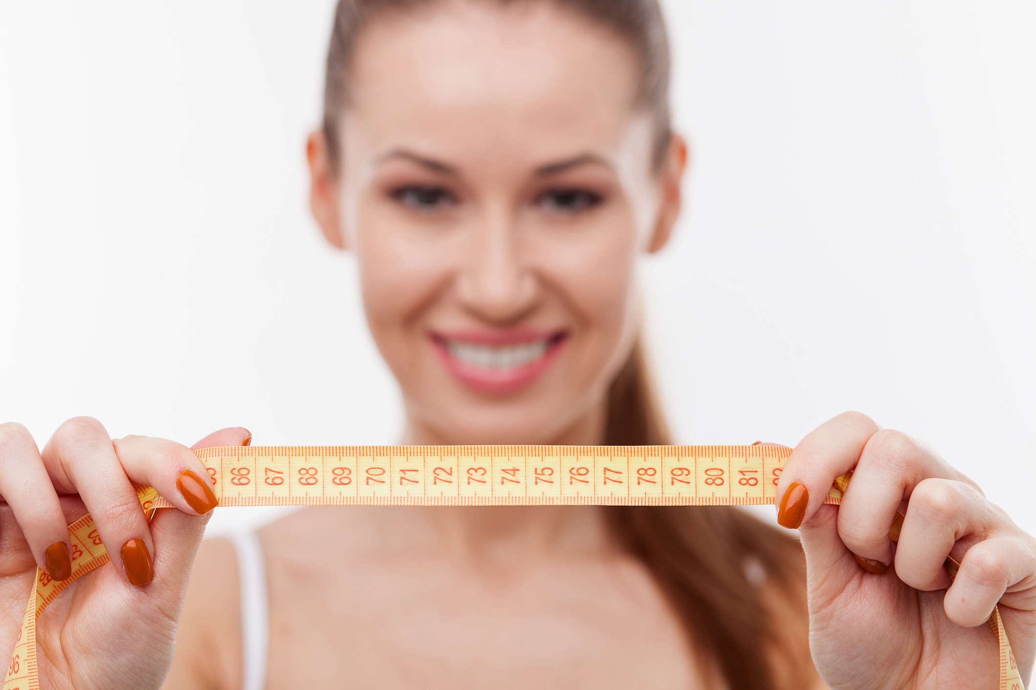 woman holding measuring tape