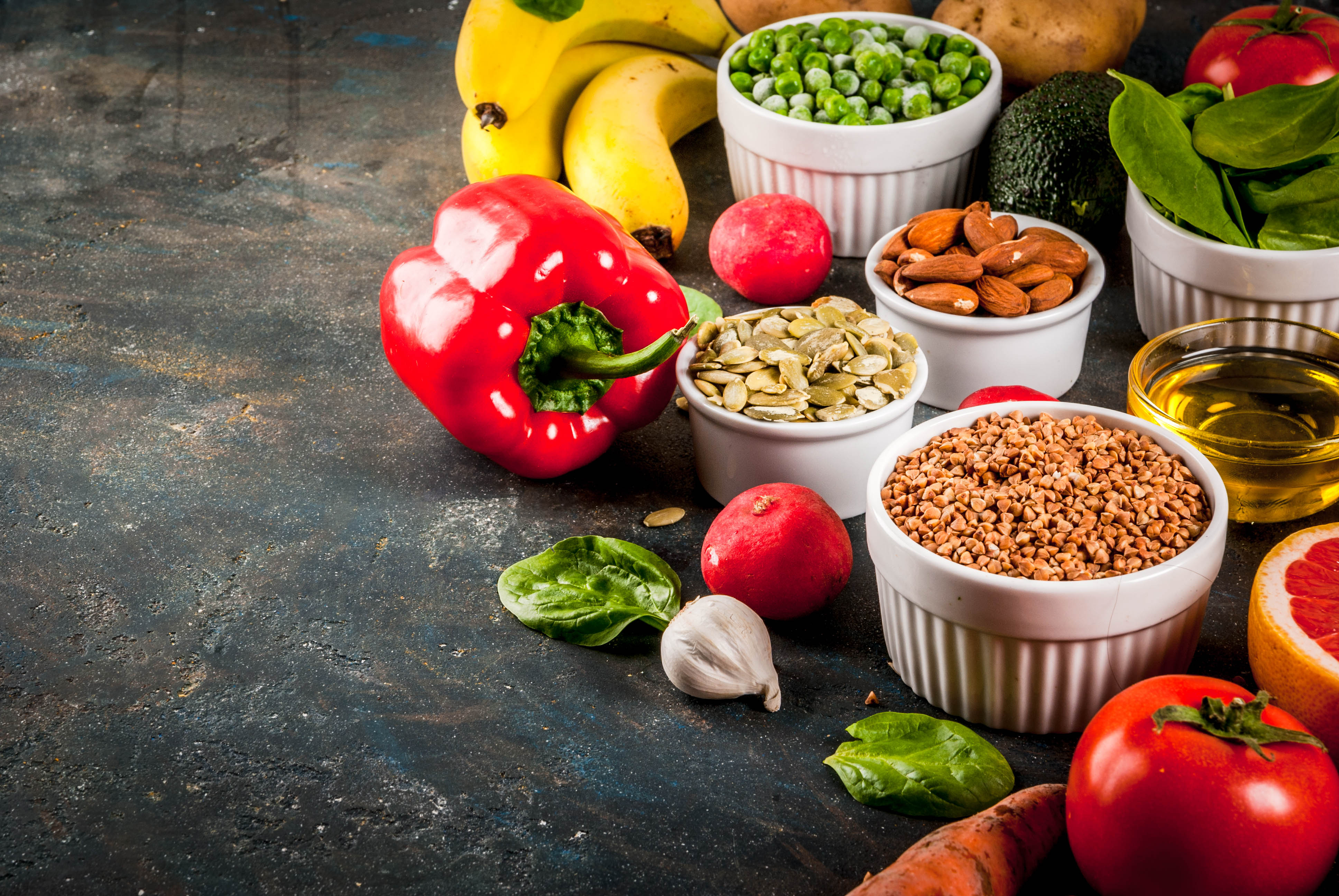 Various Fruit, Vegetables, and Nuts on a table